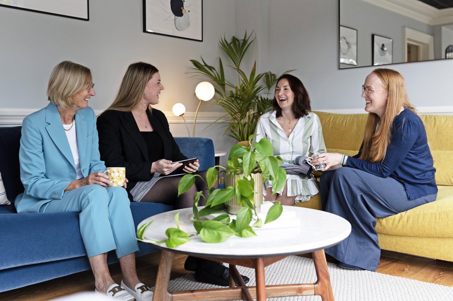 snuginteriors all female team in the showroom enjoying the sofas snuginteriors all female team in the showroom enjoying the sofas