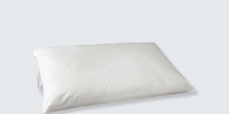 Hand-filled with 100% British wool, this pillow lets you adjust the fill for personalised support. It’s naturally temperature-regulating, hypoallergenic, and ideal for side sleepers who want control over loft and firmness.