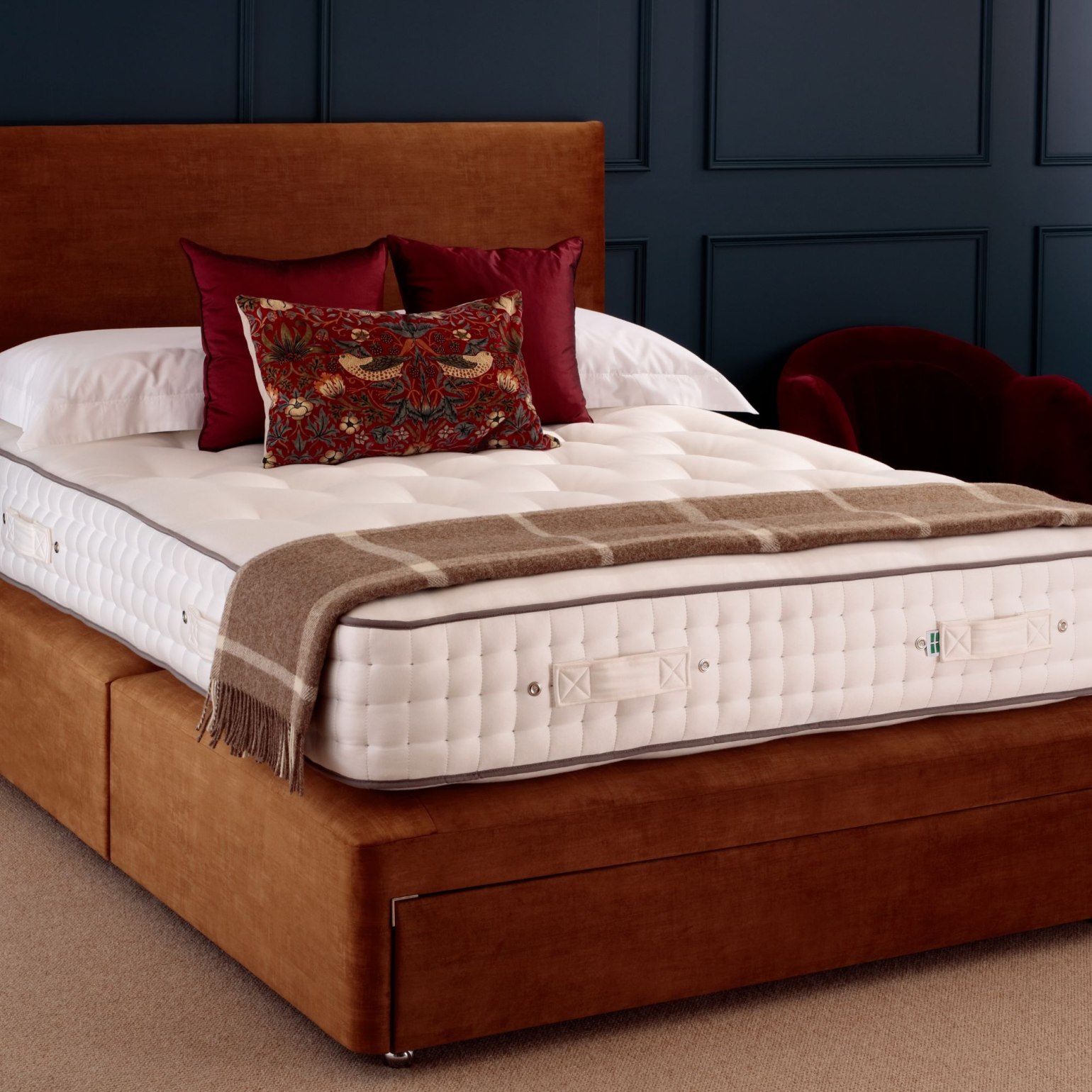 The Harting Mattress is handmade in Devon, featuring a high-count pocket spring system paired with natural layers of wool, horsetail, and cotton. It delivers supportive alignment with a breathable, resilient surface for all-night comfort. Reinforced edges and artisan craftsmanship ensure durability and strength for years to come.


	1,500 pocket springs for tailored, independent support.
	 
	Upholstered with breathable natural fibres including wool, horsetail, and cotton.
	 
	Three rows of hand side-stitching for edge-to-edge stability.
	 
	Fully handmade in Devon using traditional craftsmanship.
	 


Why It Works for Back Sleepers: The high spring count provides structured support to keep the spine level, while natural fillings relieve pressure without letting the body sink.

Best For: Those who want a luxurious, breathable mattress with strong edge support and resilient comfort for long-lasting use.
