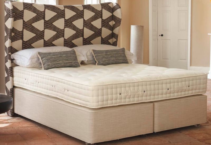 Indulgently soft with natural upholstery, this mattress provides a sink-in feel without compromising support, thanks to its dual-layer pocket spring system providing optimal support for a restful night’s sleep. Pairing with a pocket sprung divan base allows the mattress and base to work in harmony, enhancing comfort and extending longevity