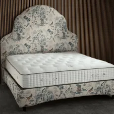 Queen Ann bed frame with mattress undressed