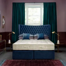 Hypnos Wool origins 10 Mattress semi dressed with pillows