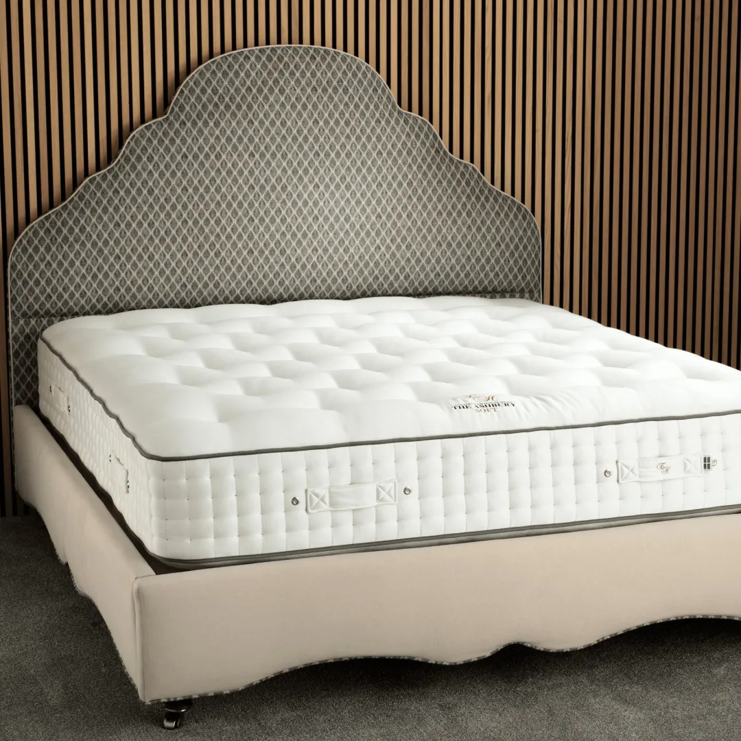 Queen Anne bed frame with mattress undressed