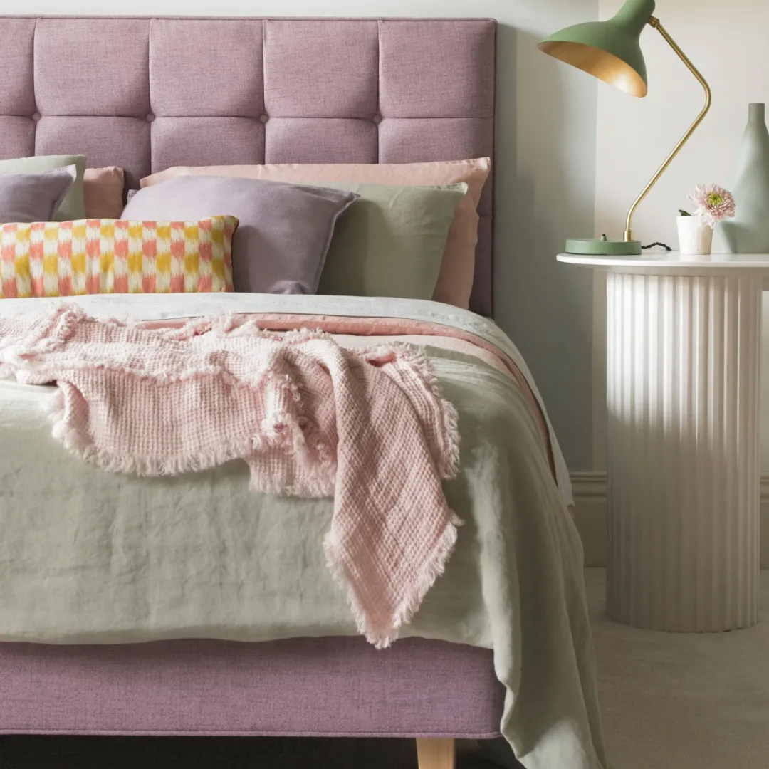Close up of Hypnos Dressed Shallow Pocket Sprung Divan Base with Natural Tapered Wooden Legs, upholstered in Brooklyn 703 Lil