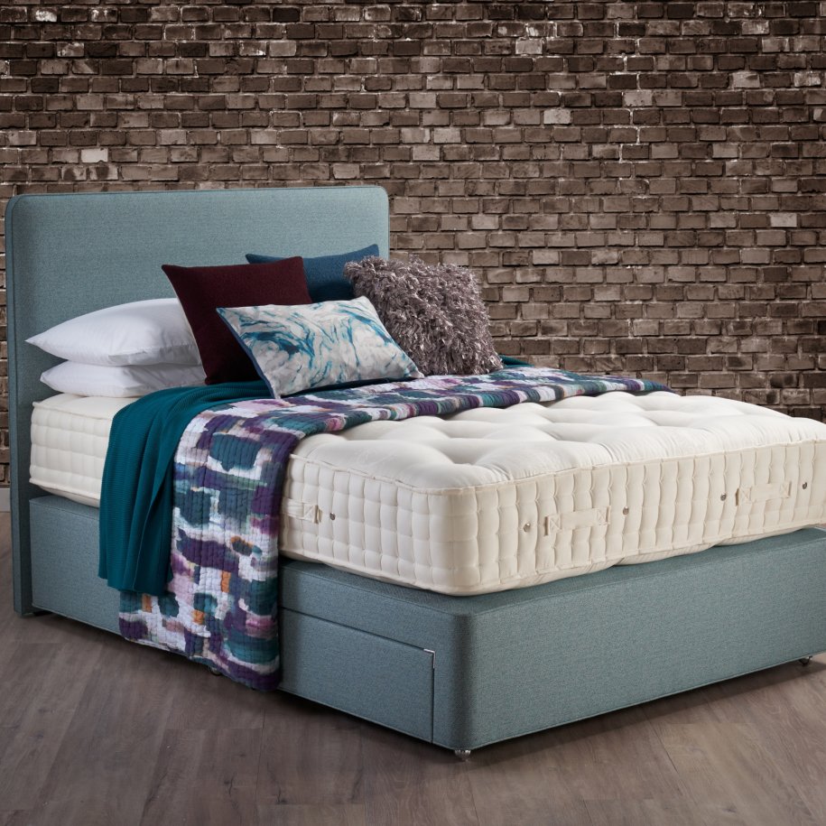 Hypnos Wool origins 6 Mattress on Divian Bed semi dressed