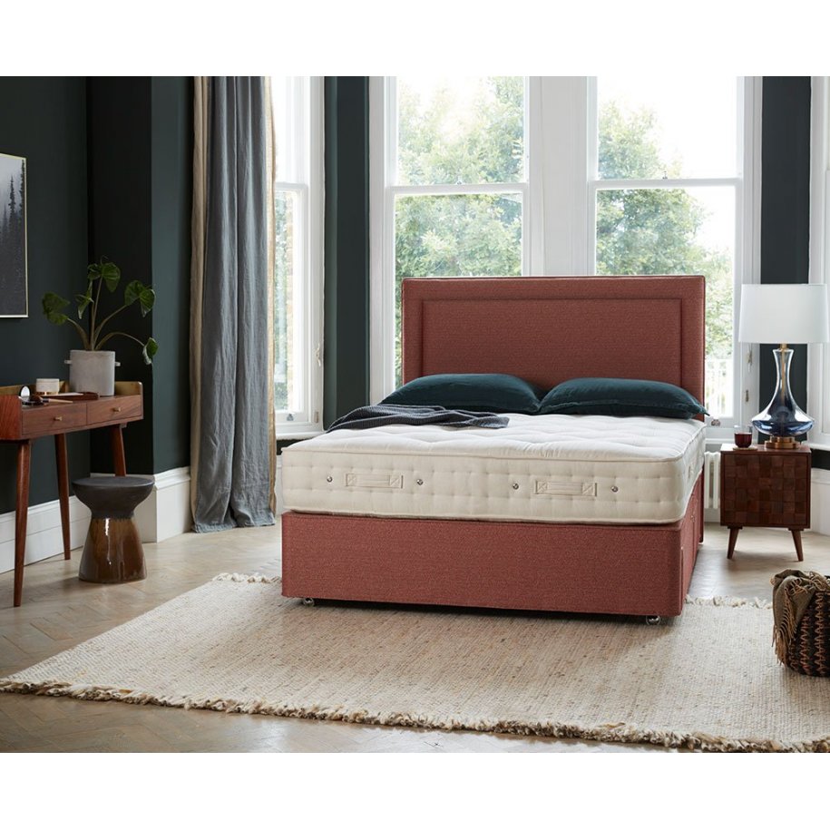 Hypnos Orthos Origins 8 mattress with deep divan bed and Isobelle headboard in a raspberry coloured fabric